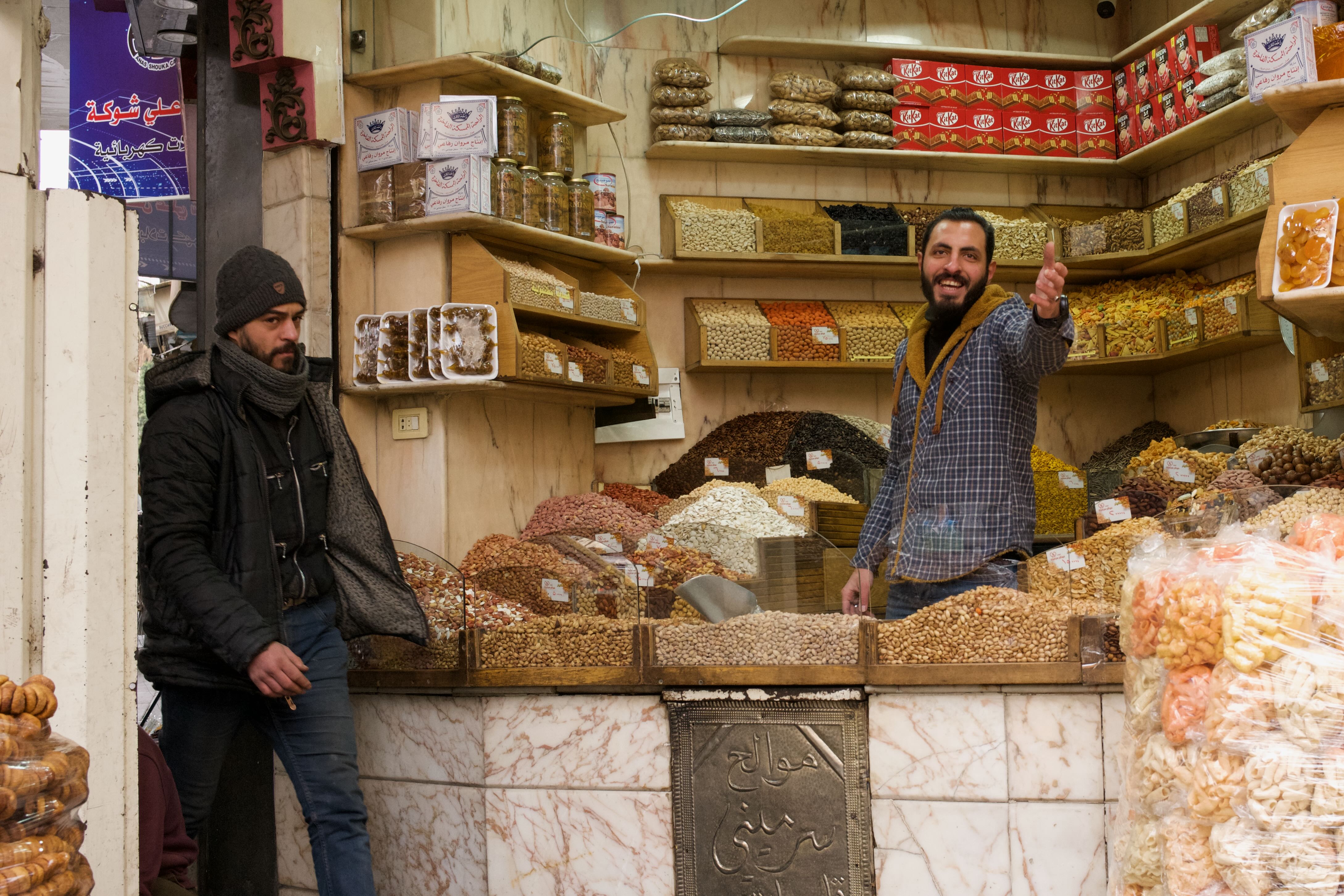 Beckoning Shop Owner